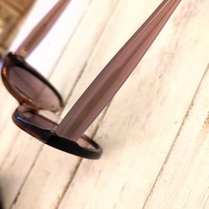 Tortoise and lavender cat eye sunglasses.